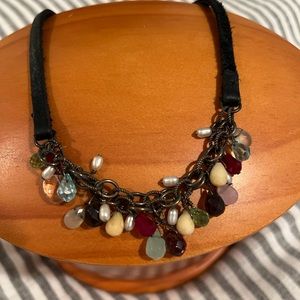 Silpada gemstone necklace with black leather chain.